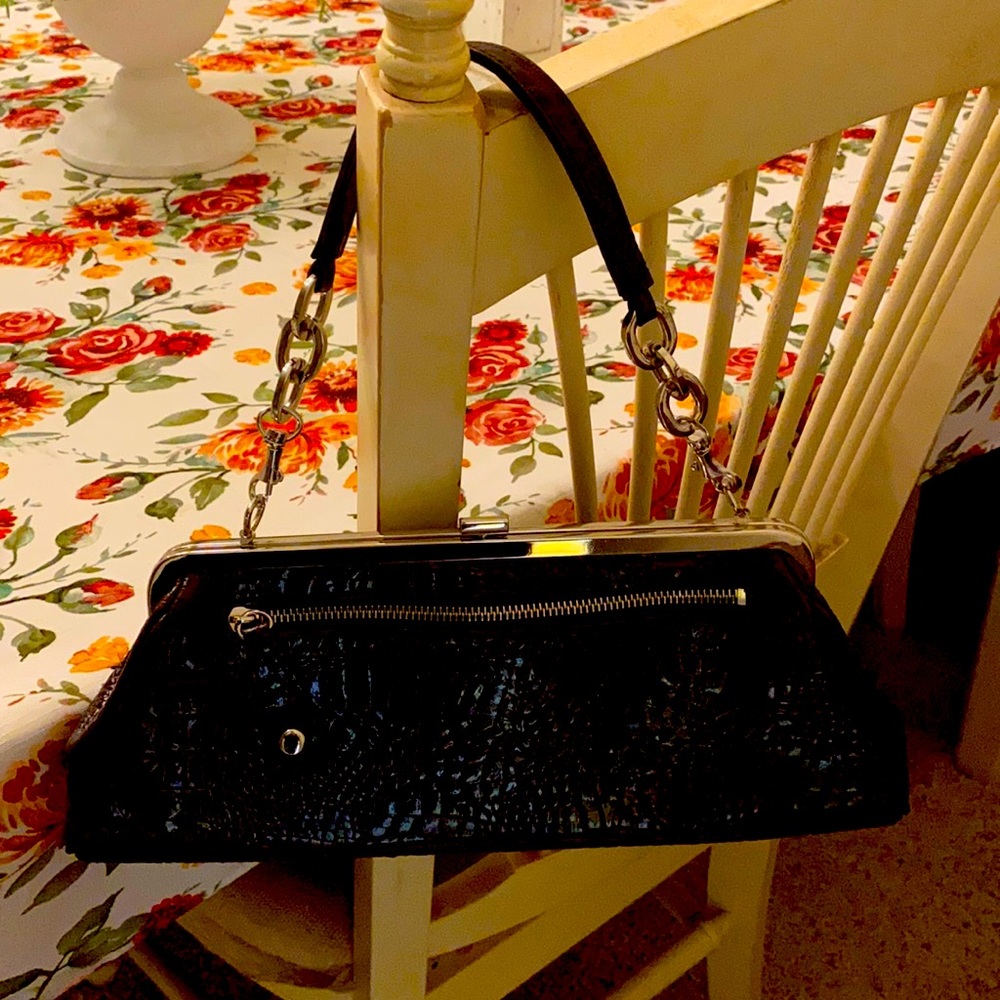 Apostrophe faux croc clutch.never used.